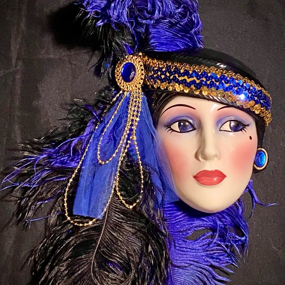 Elegant Blue and Gold Feathered Headpiece